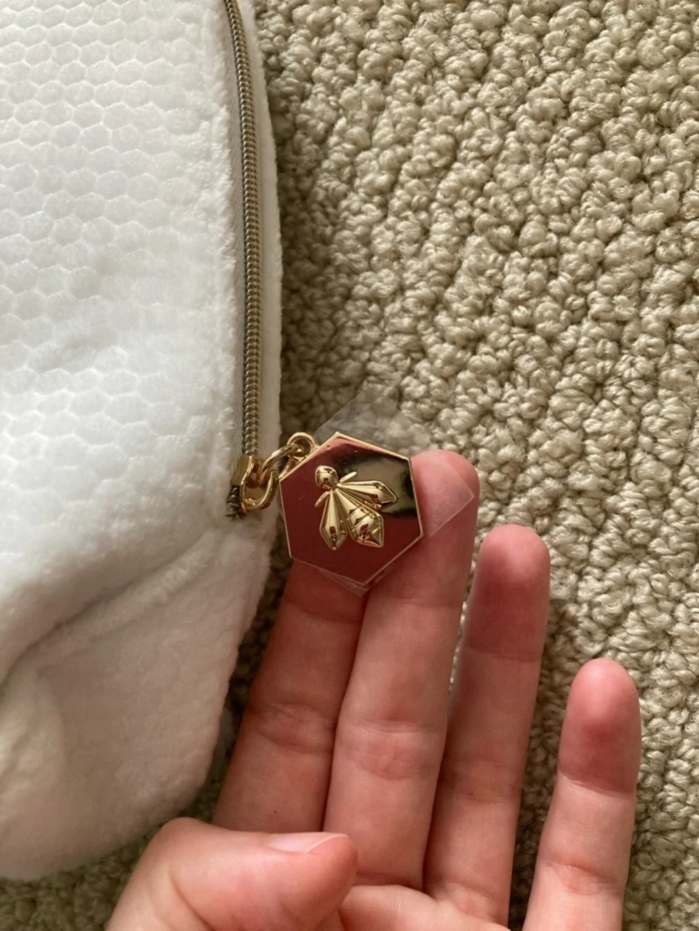 GUERLAIN White Cosmetic Pouch with Gold Bee Accent